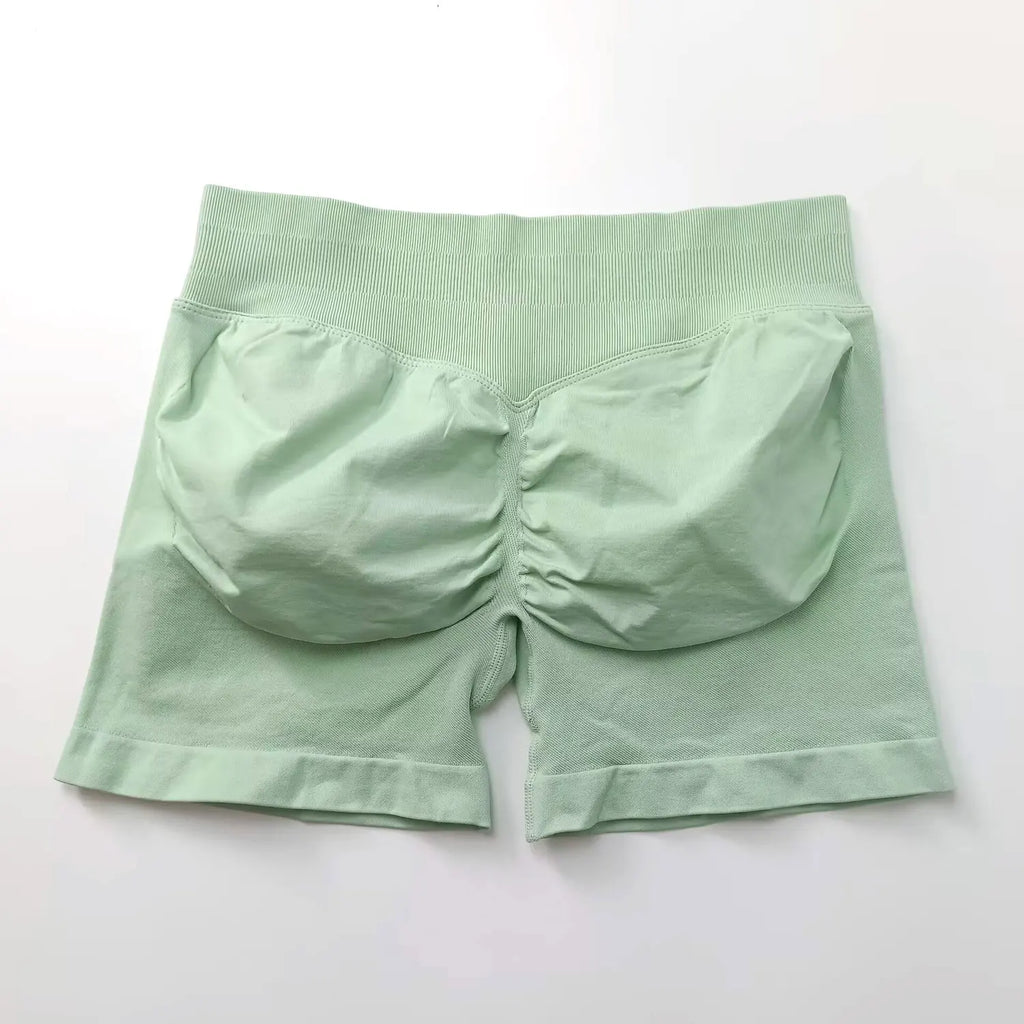 Short de sport sans coutures NCLAGEN 4,5 pouces pour femme, effet push-up, idéal pour le fitness, le yoga et la course à pied. 
