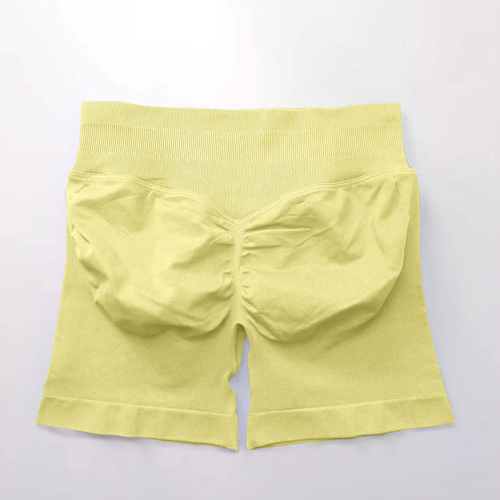 Short de sport sans coutures NCLAGEN 4,5 pouces pour femme, effet push-up, idéal pour le fitness, le yoga et la course à pied. 