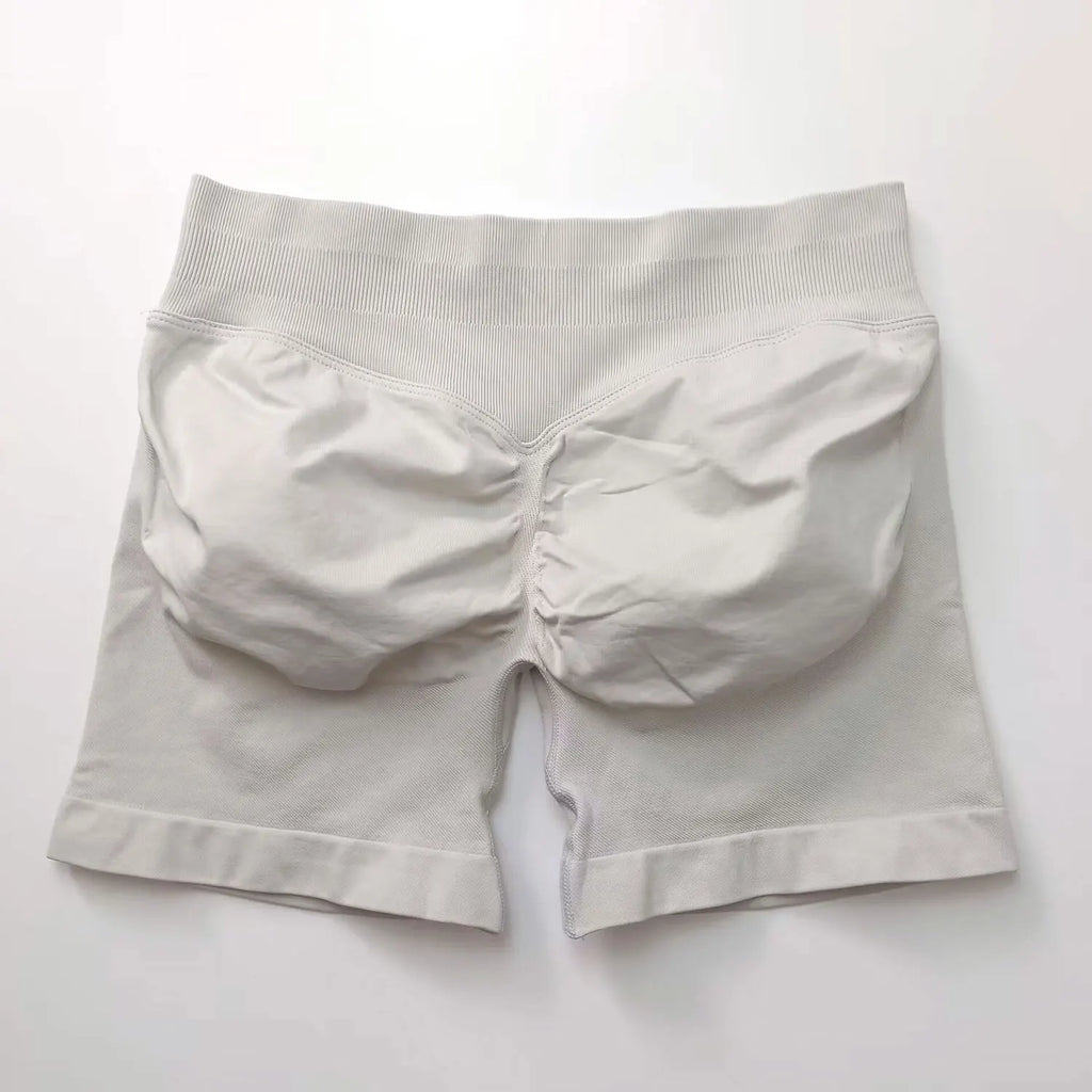 Short de sport sans coutures NCLAGEN 4,5 pouces pour femme, effet push-up, idéal pour le fitness, le yoga et la course à pied. 